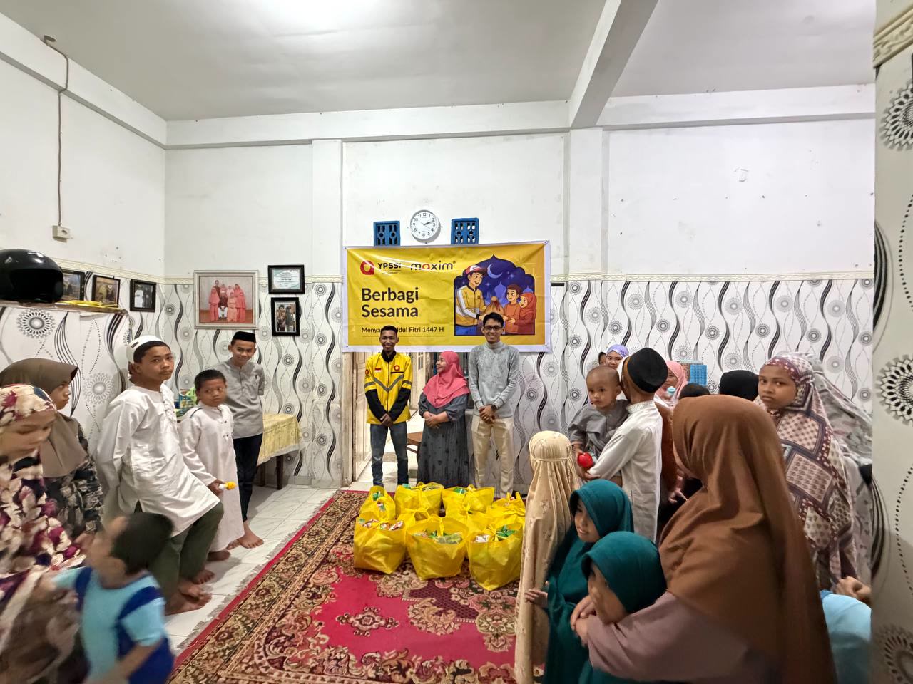 Rayakan Semangat Berbagi di Bulan Suci Ramadan, Maxim Salurkan Santunan Anak Yatim di Makassar